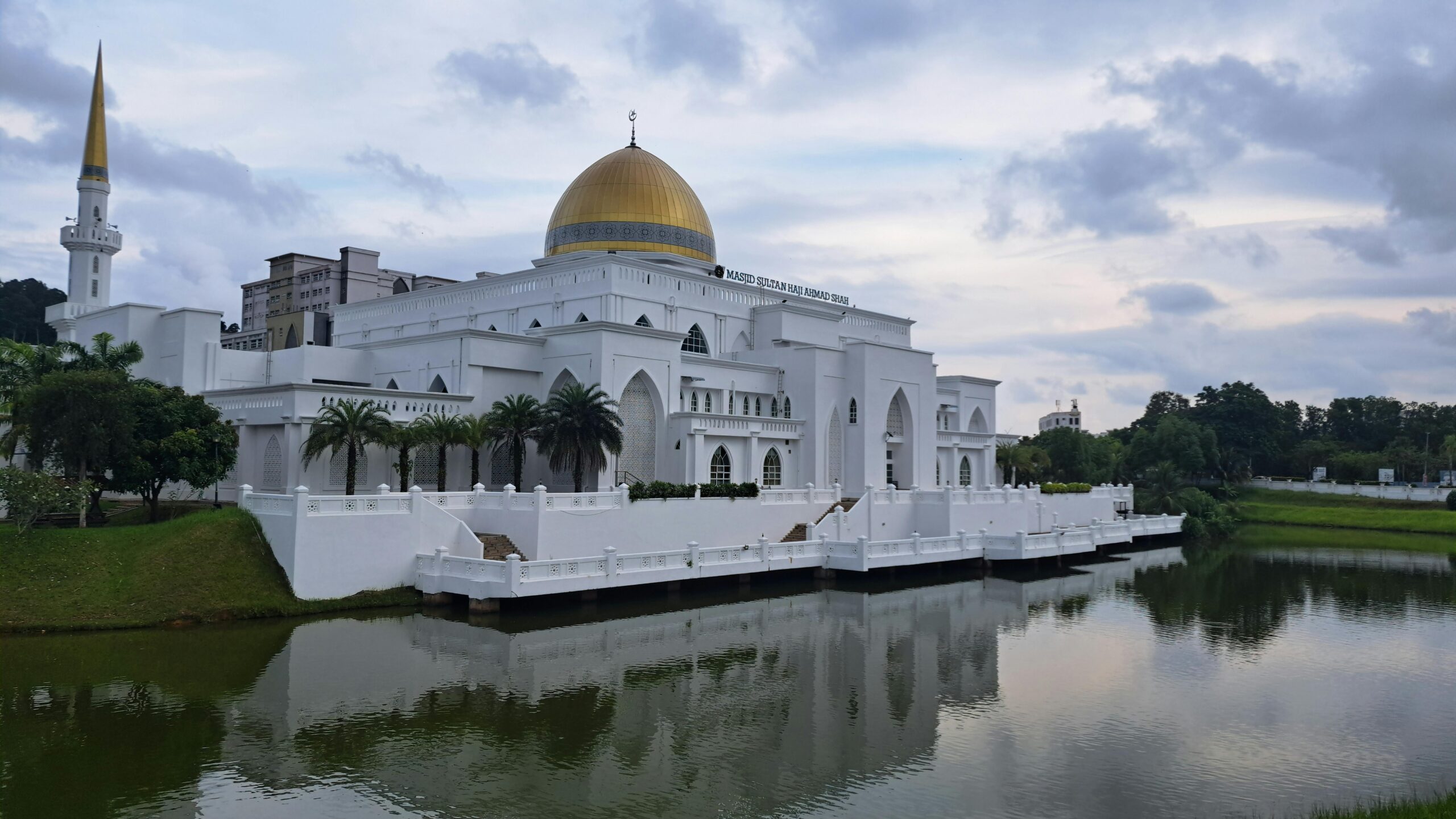 Elegant architecture of Sultan Ahmad Shah State Mosque with reflection in Kuantan, Malaysia.